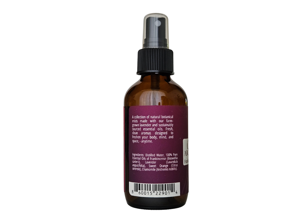 4 fl oz mist bottle showing ingredient label: frankincense, lavender, chamomile, sweet orange | no synthetic fragrance