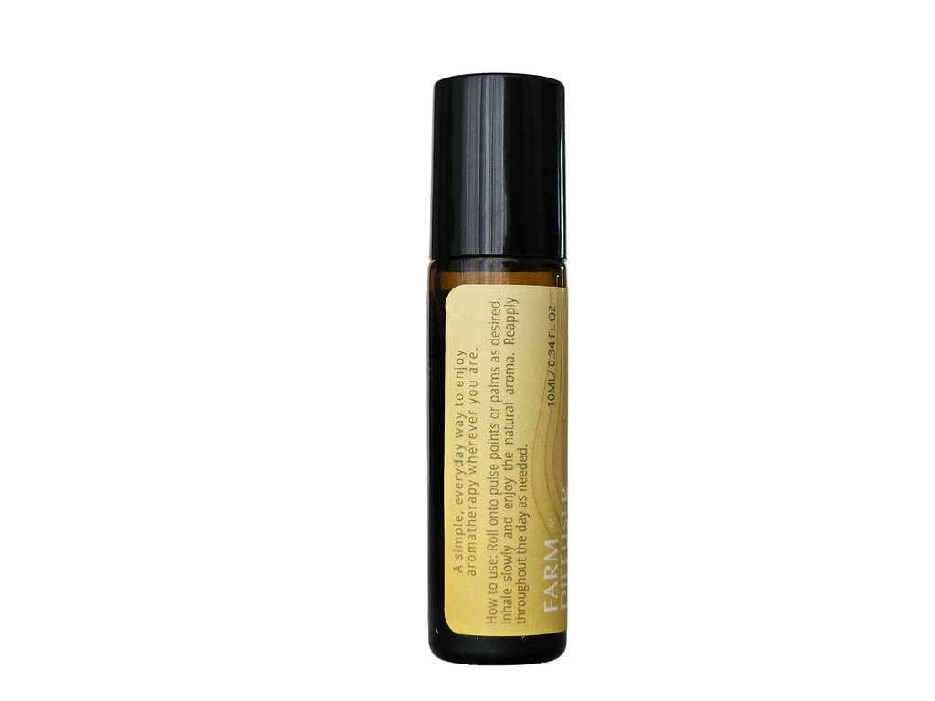 ROOTED aromatherapy roll-on with patchouli Himalayan cedarwood and rose otto in sweet almond oil | Farm to Diffuser