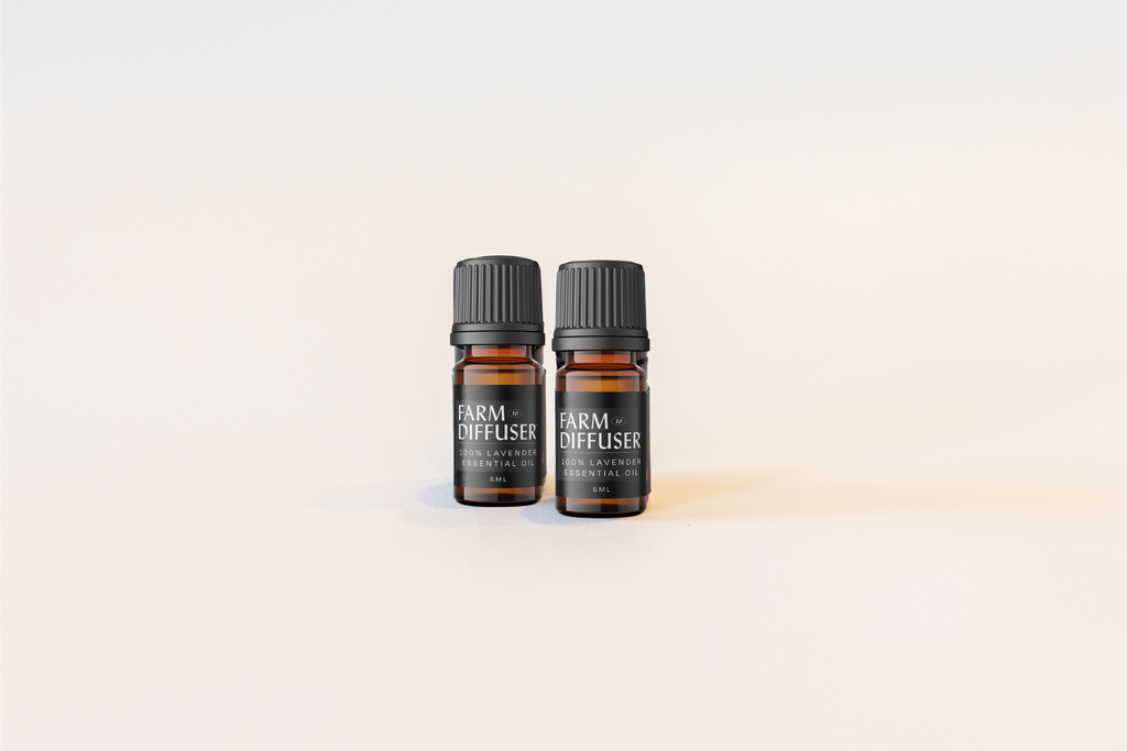 2 5ml bottles of farm to diffuser lavender essential oil with white background