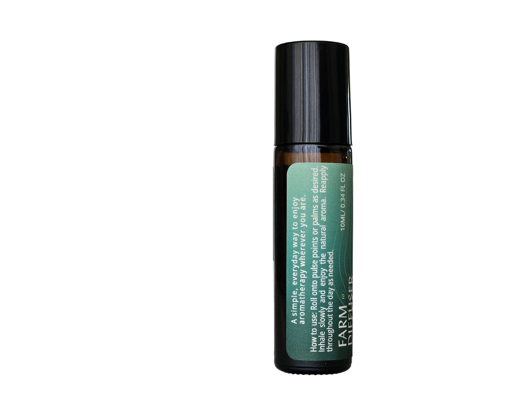UNWIND aromatherapy roll-on with sandalwood patchouli rose absolute ylang ylang in sweet almond oil | Farm to Diffuser