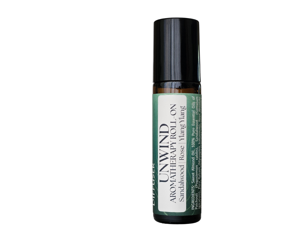 UNWIND aromatherapy roll-on with sandalwood patchouli rose absolute ylang ylang in sweet almond oil | Farm to Diffuser